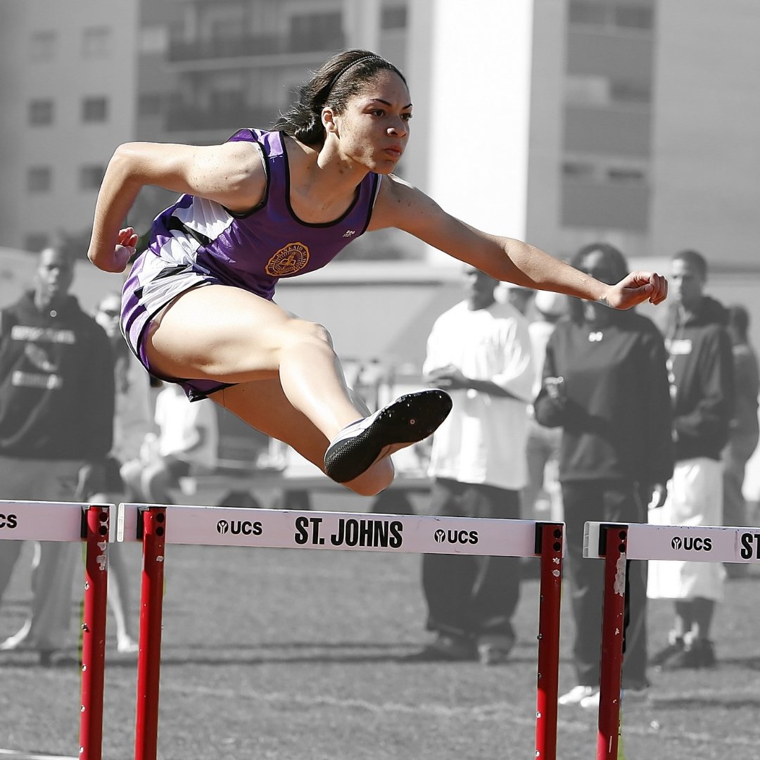 female hurdler during track meet