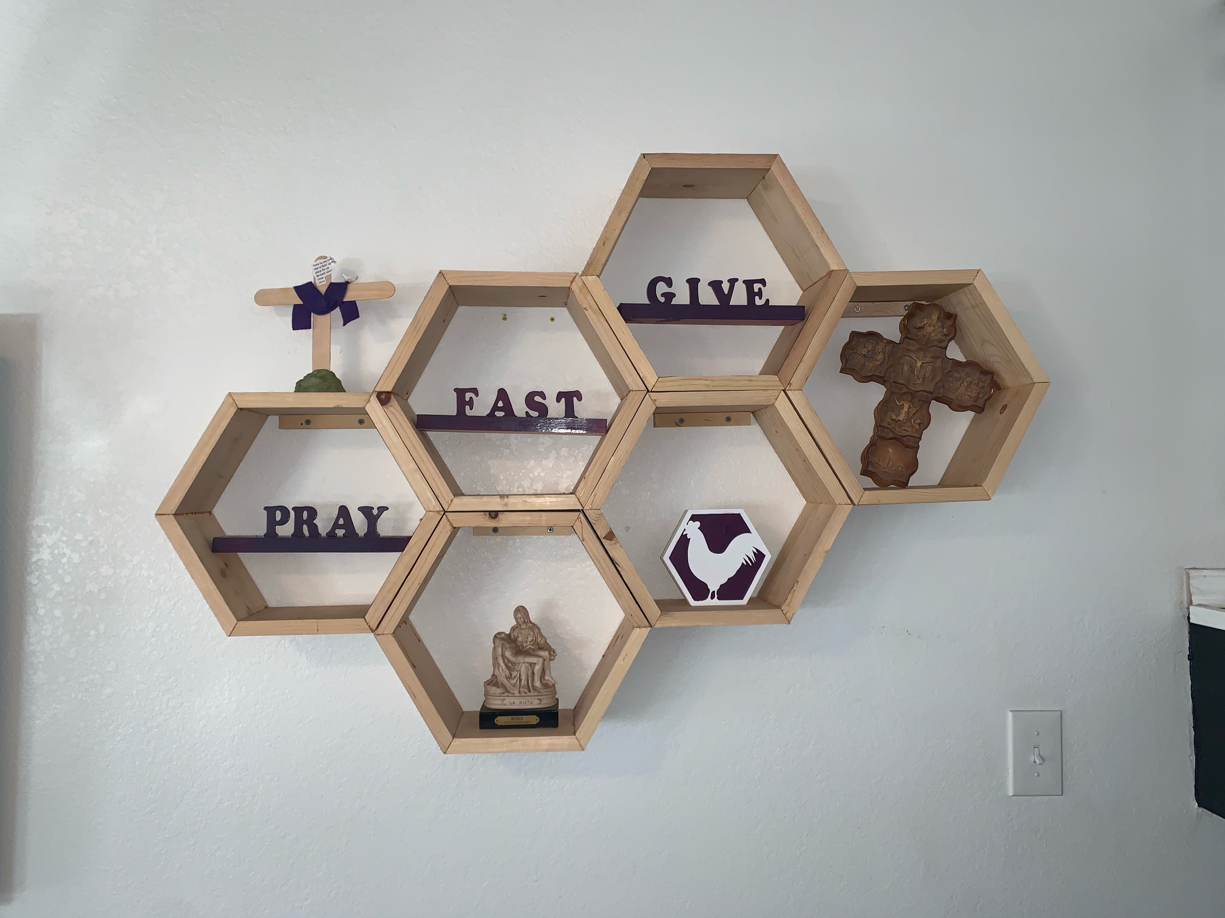 Lent wooden honeycomb boxes with pray fast give words and related objects