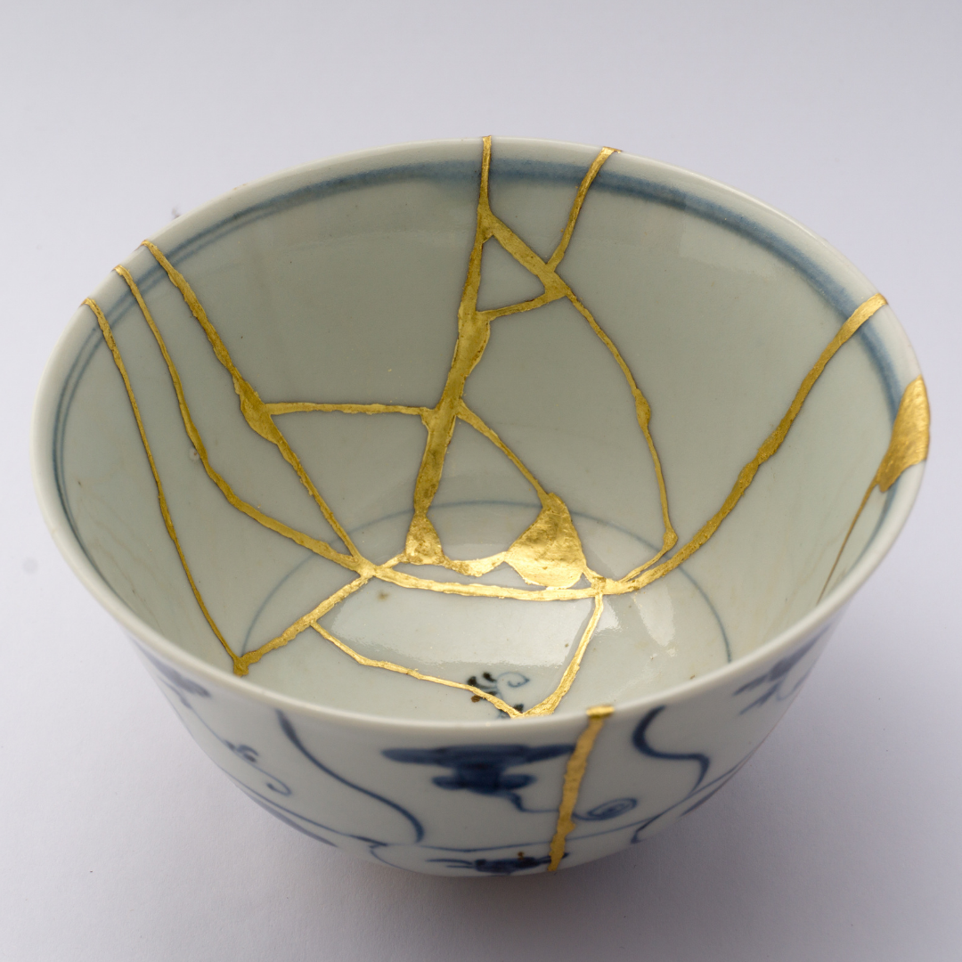 Kintsugi bowl with cracks repaired in gold