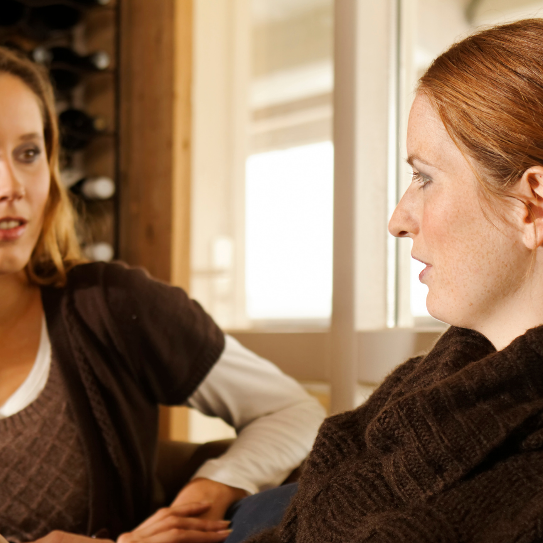 two women in conversation