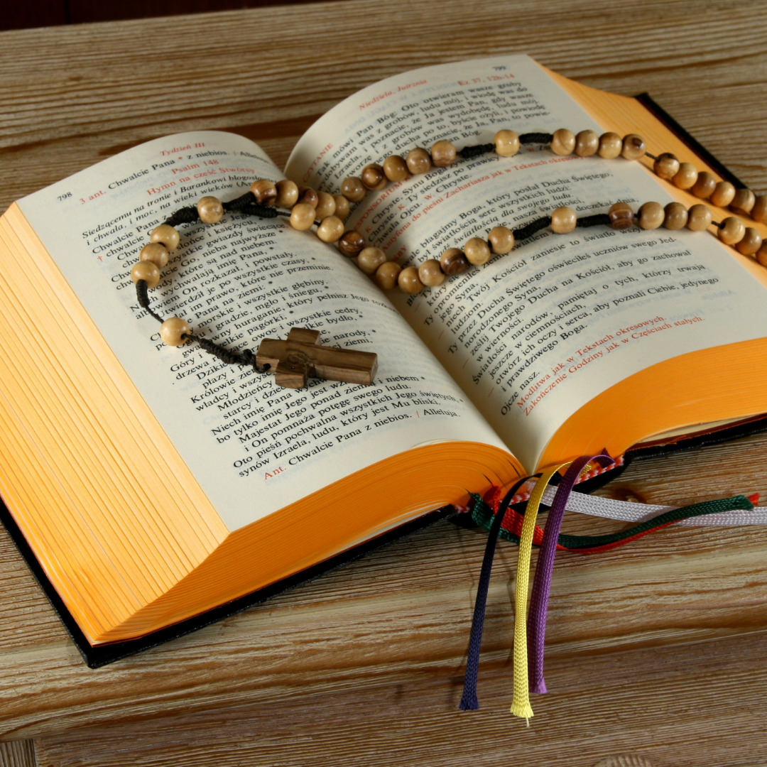 prayer book with rosary