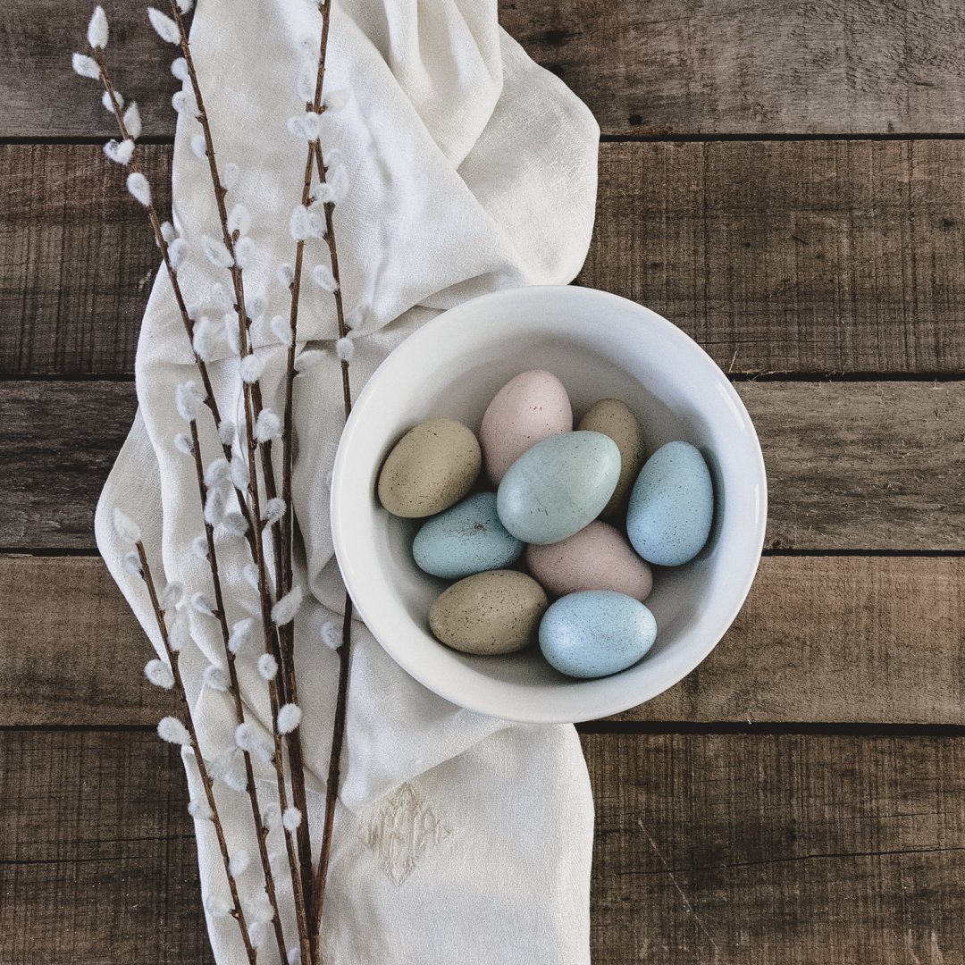 bowl of Easter eggs, pussy willow, cloth napkin