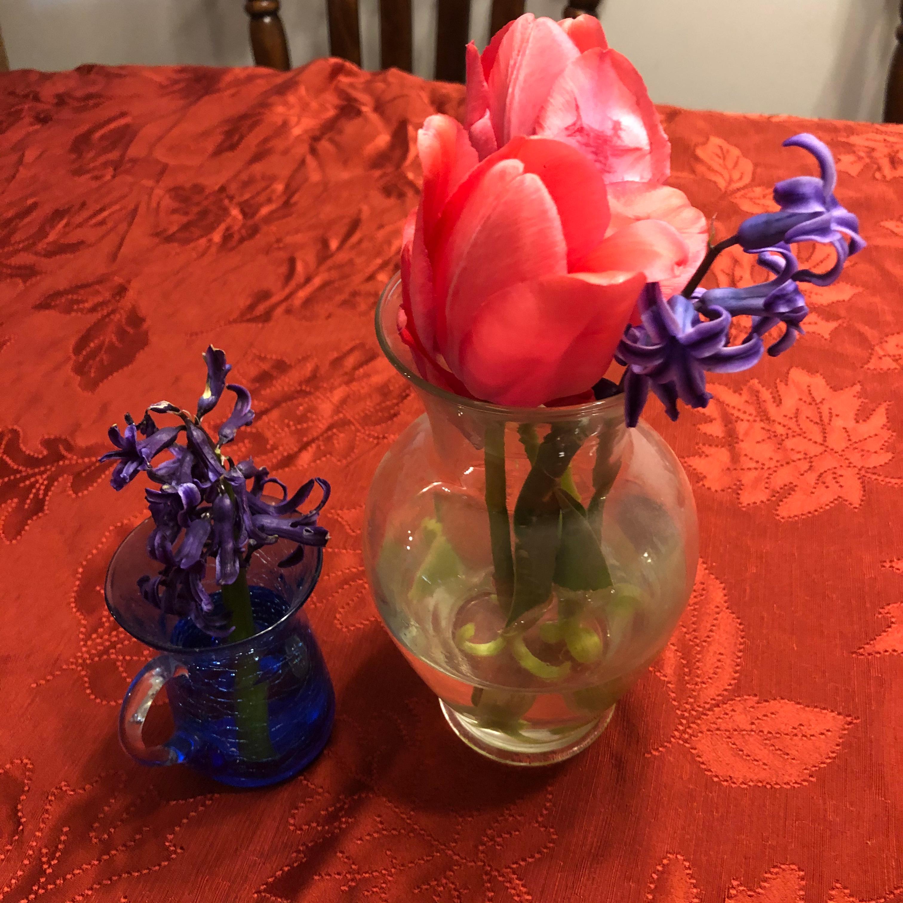 small vases of flowers