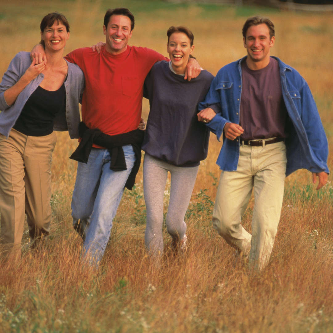 people walking in a field