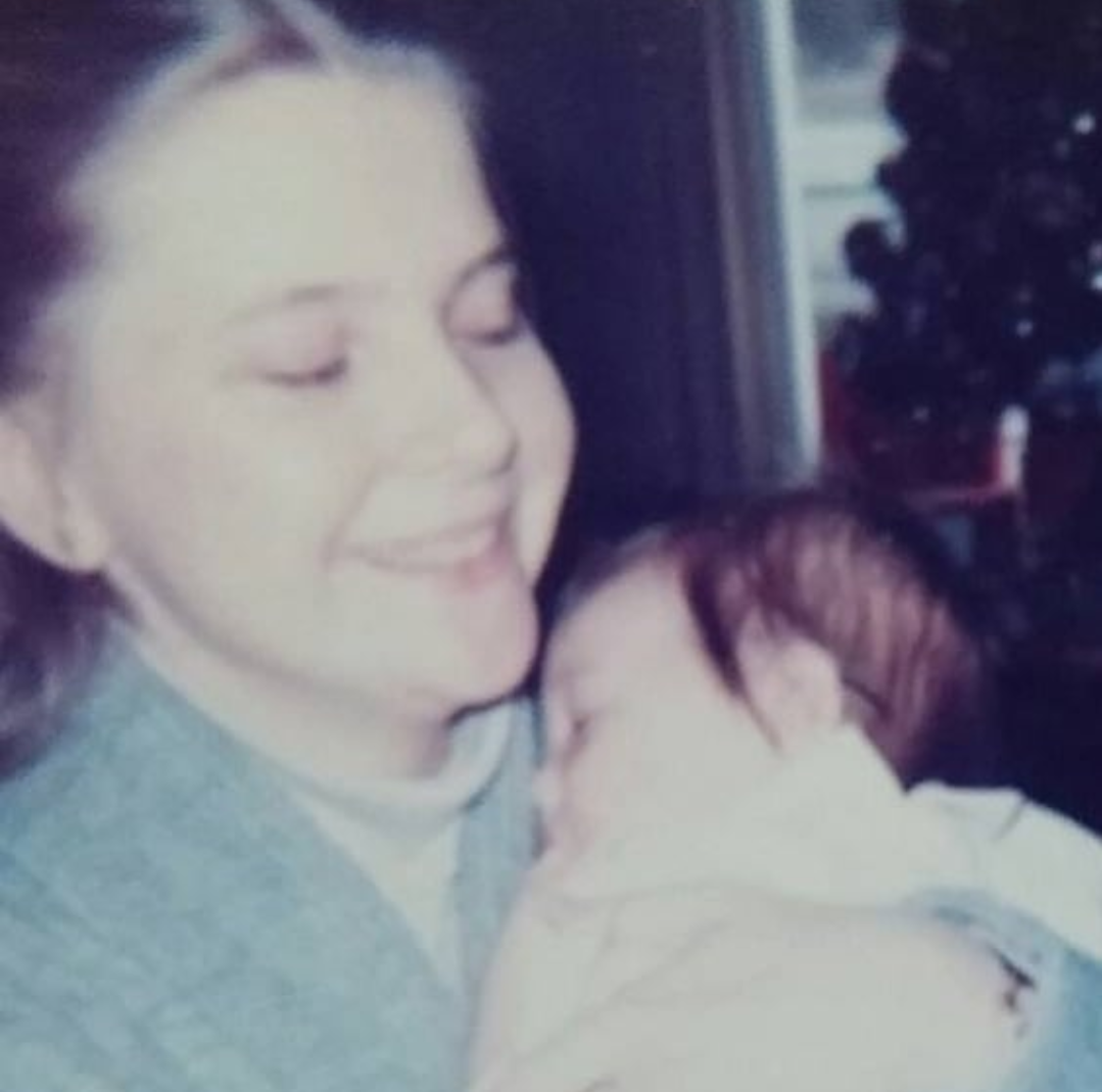 vintage photo of mother holding baby