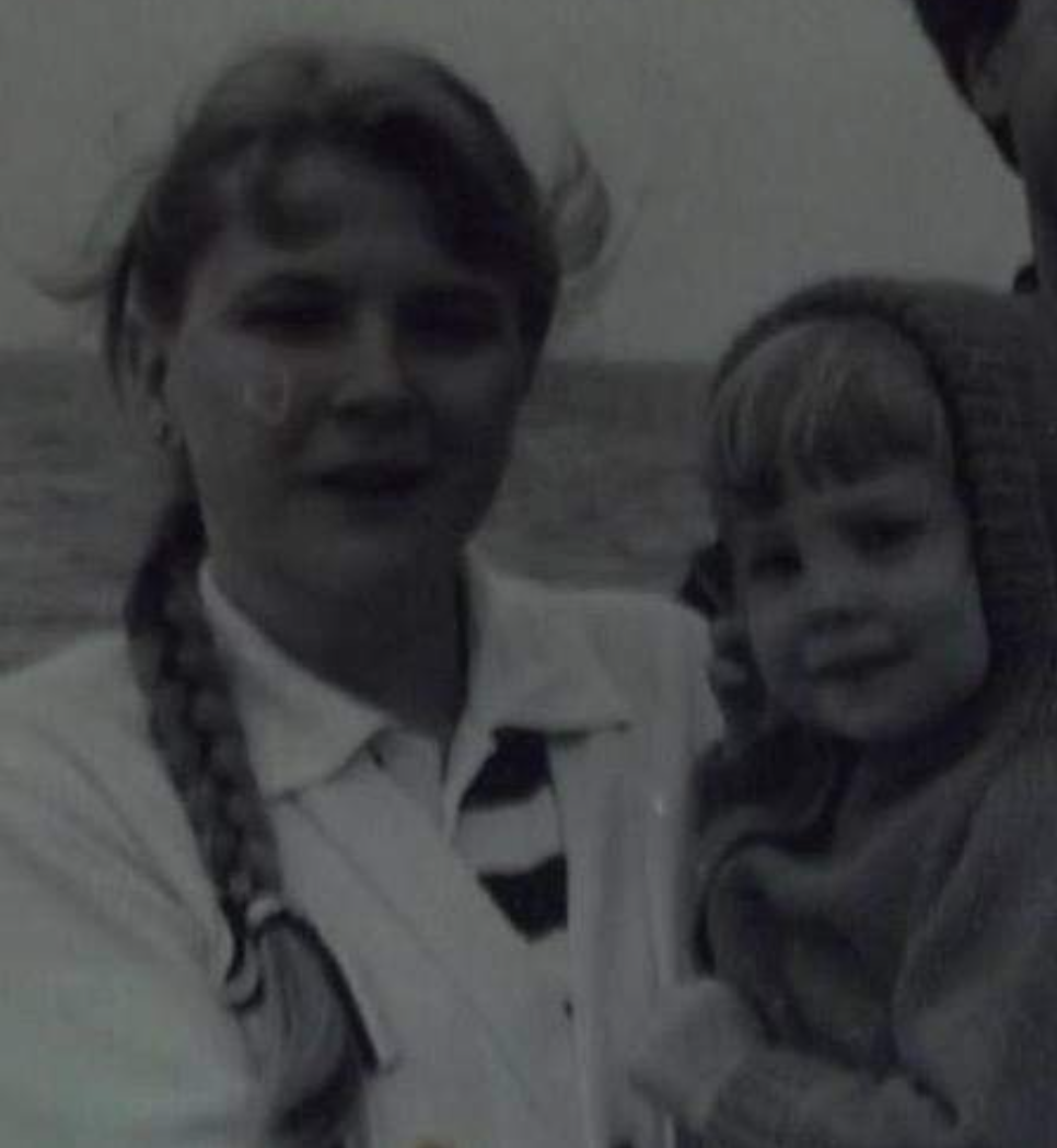 vintage photo of mother holding little girl