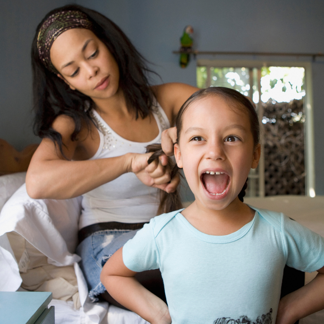 mom doing child's hair