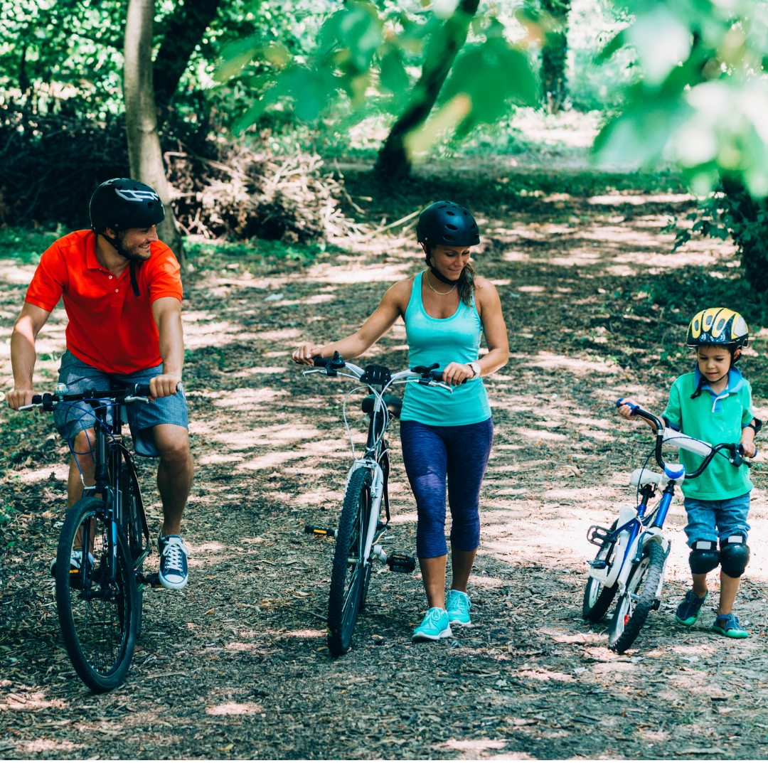 family riding bikes