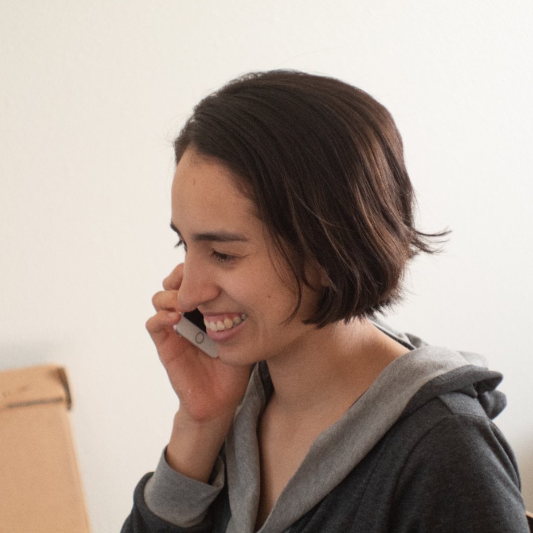 woman talking on the phone and smiling
