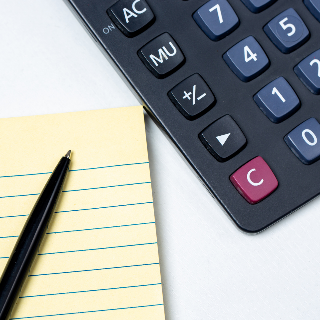 calculator and yellow paper