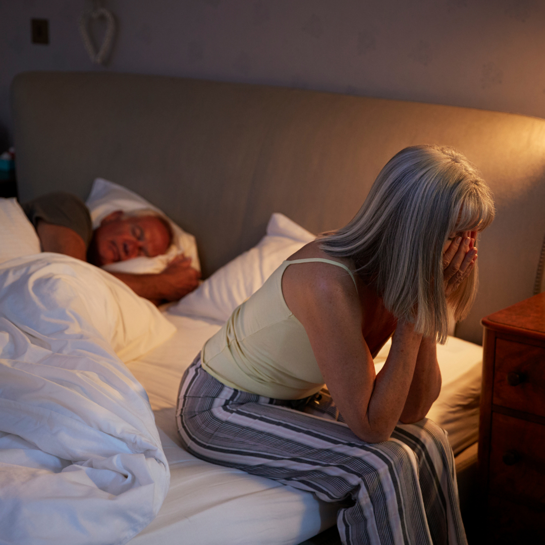 worried woman can't sleep