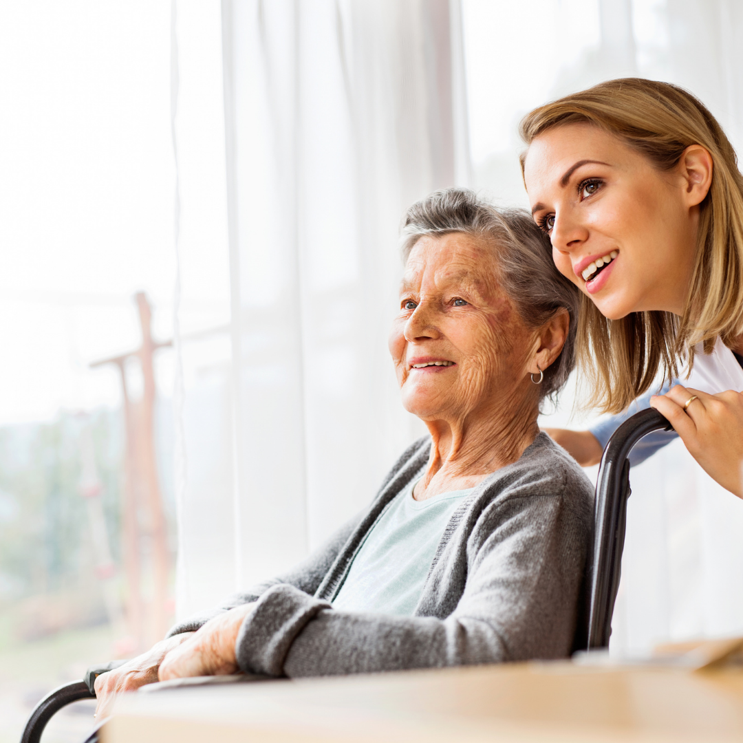 elderly woman and young woman smiling