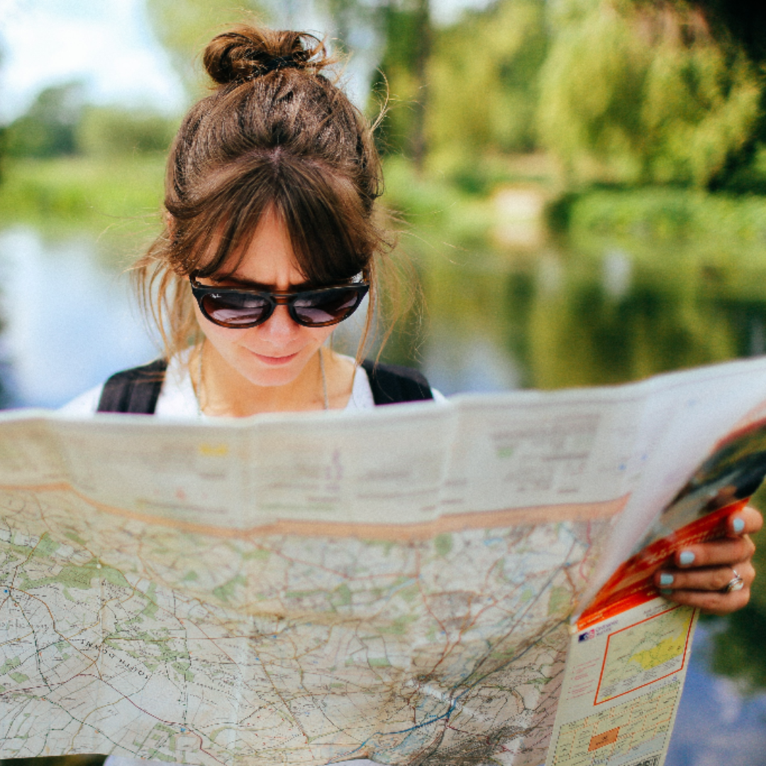 woman reading a map