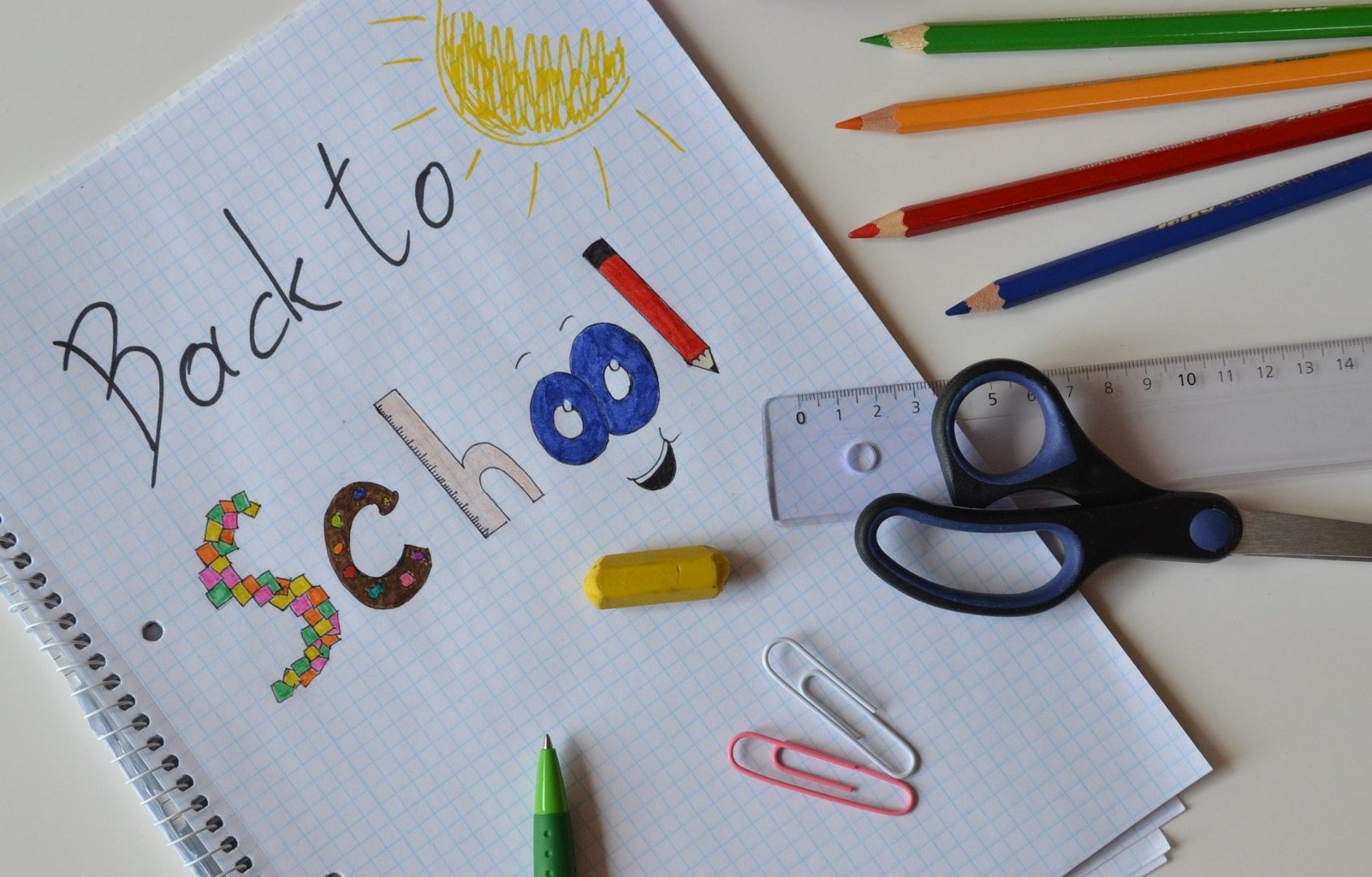 "back to school" doodle and school supplies