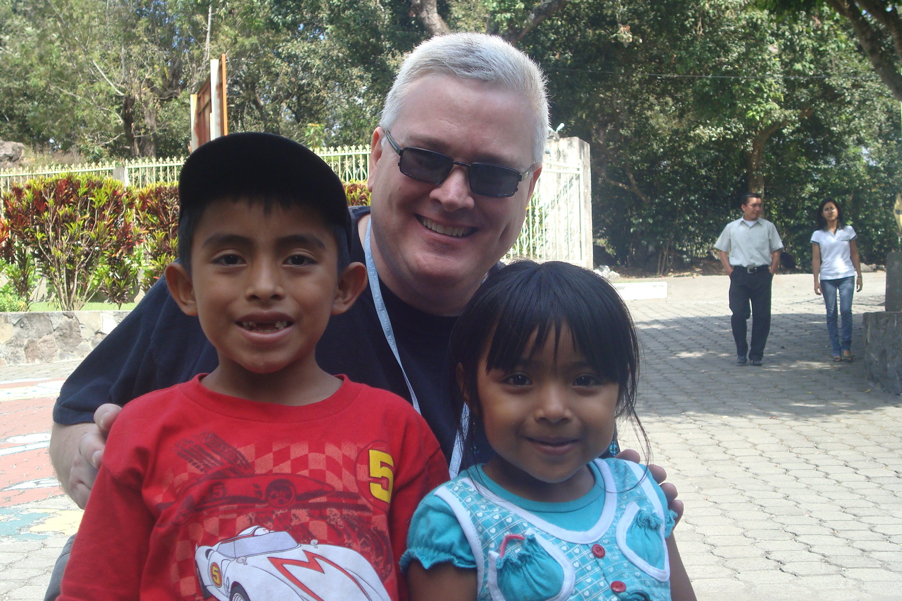 In a 2009 photo from the Unbound archives, writer-editor Larry Livingston meets his sponsored friends, Alvaro and Maria, at the local Unbound program center in Guatemala. Today, Alvaro is 19 and Maria is 16.