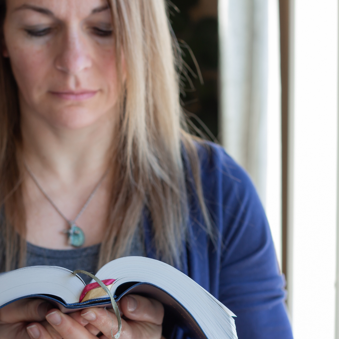 woman reading a Bible