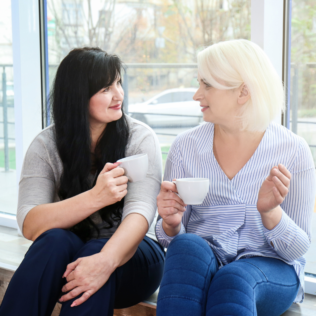 2 women with teacups