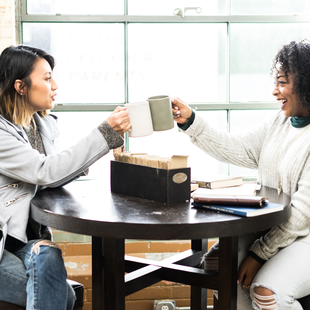 2 women talking over coffee