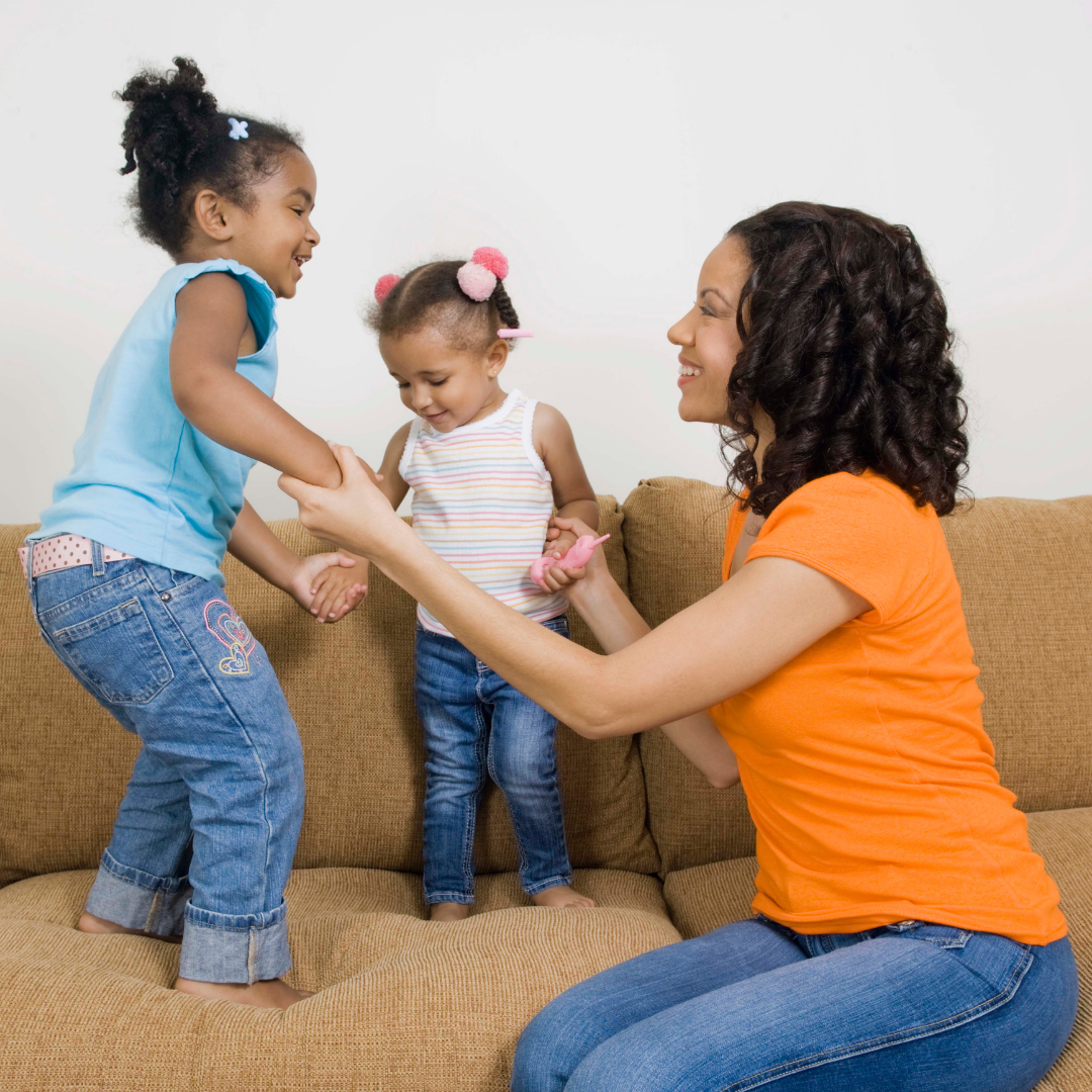 mom playing with 2 toddlers