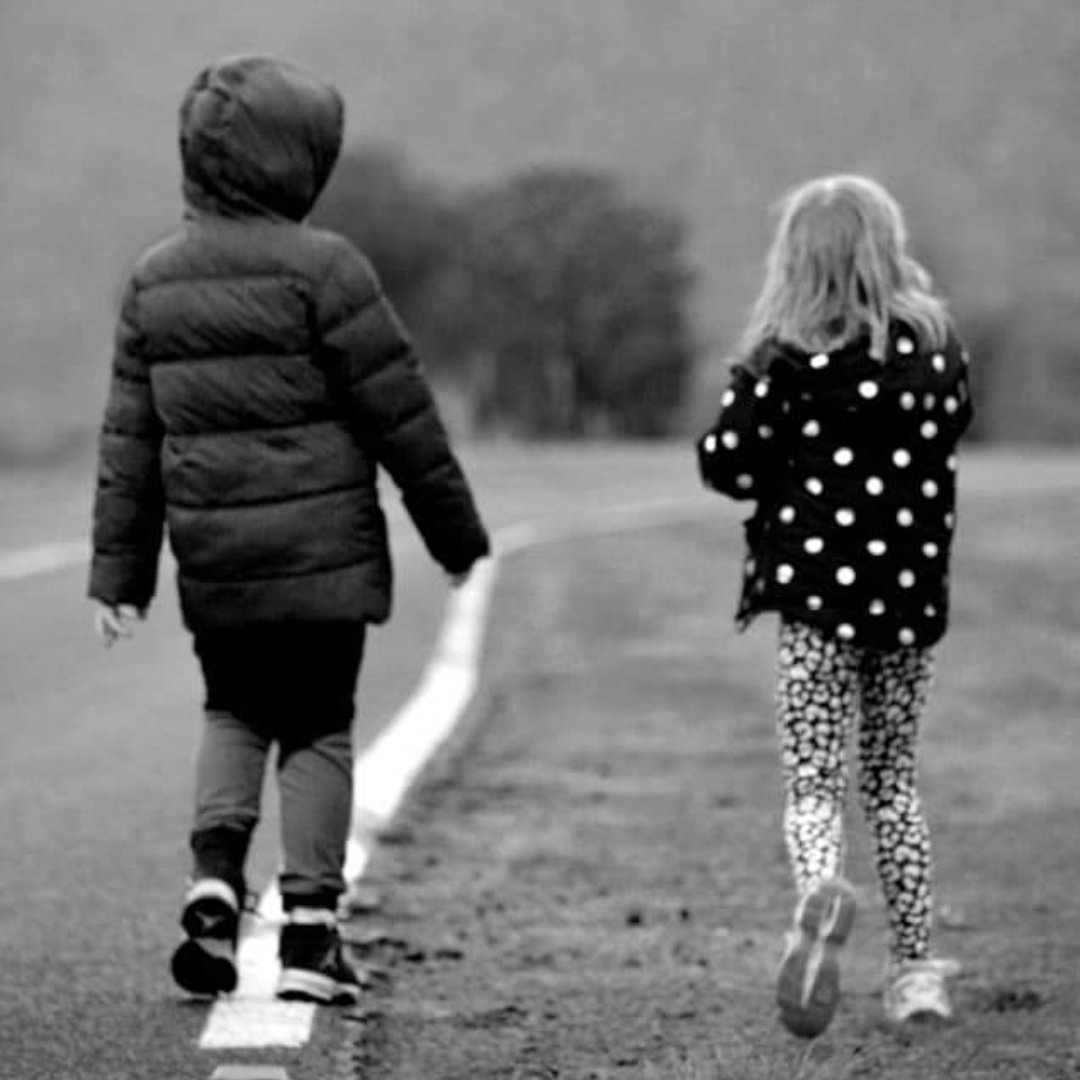 small children walking away