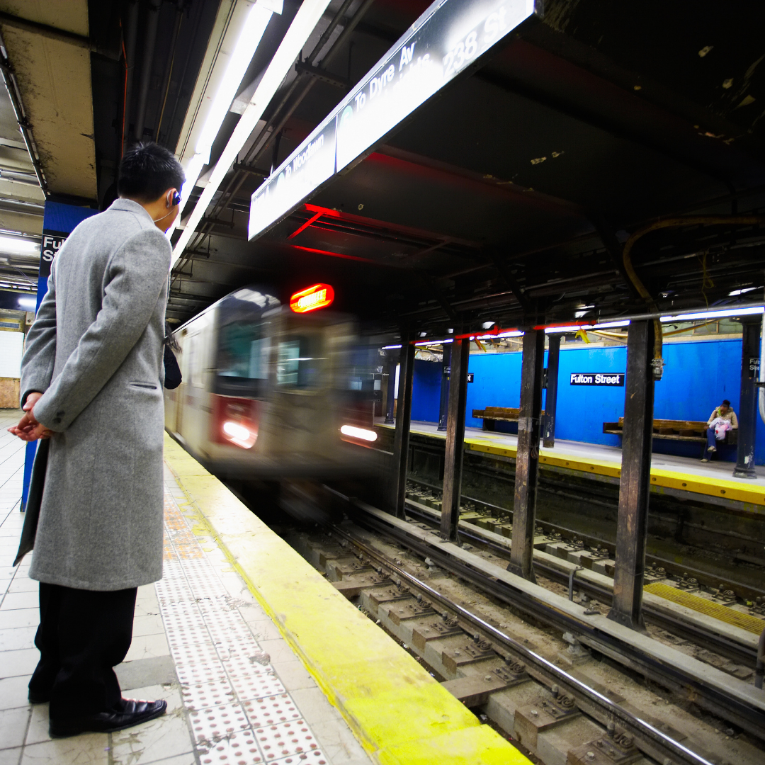 man waiting for a train