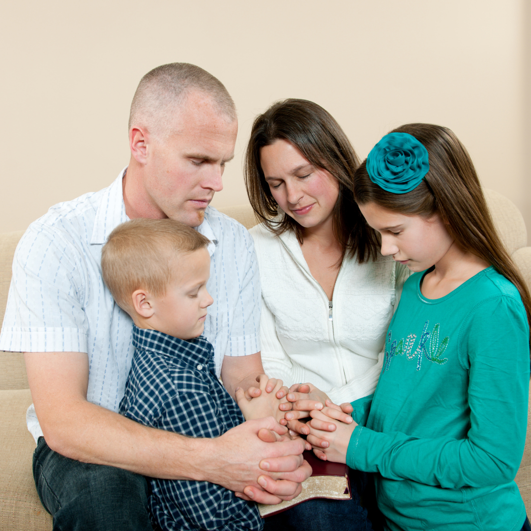 family praying