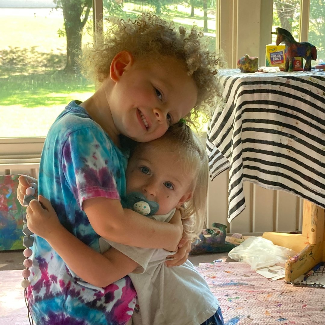 toddlers hugging