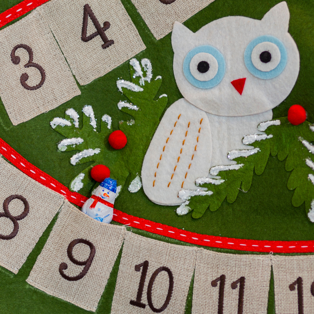 Advent calendar with little pockets and owl decoration