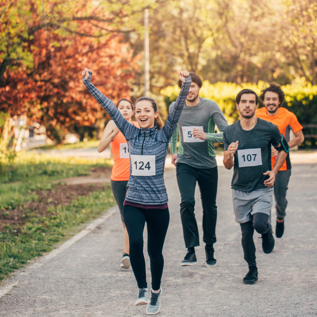runners at the end of a race, in the fall