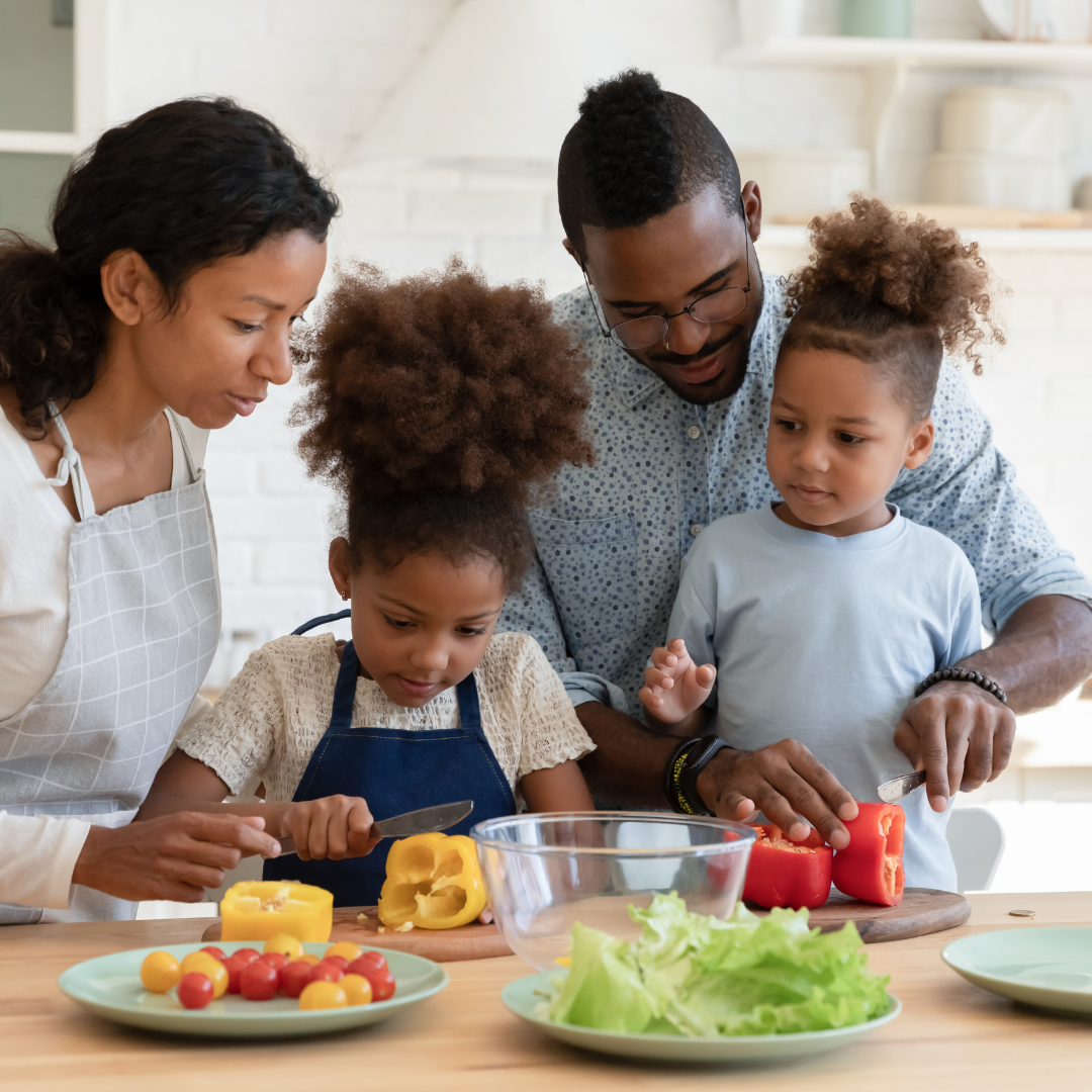 family preparing vegetables for a meal