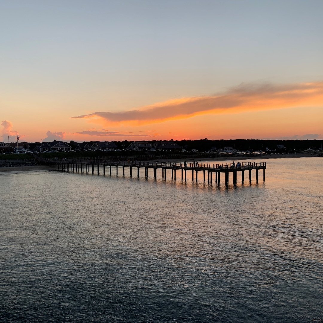 sunset over ferry dock