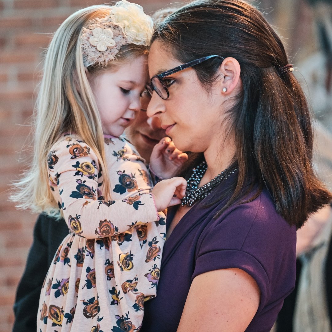 mom with little girl at Mass