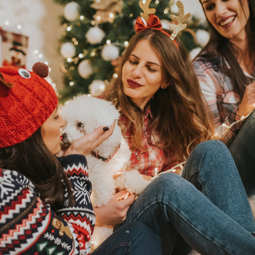 friends and a puppy at Christmas