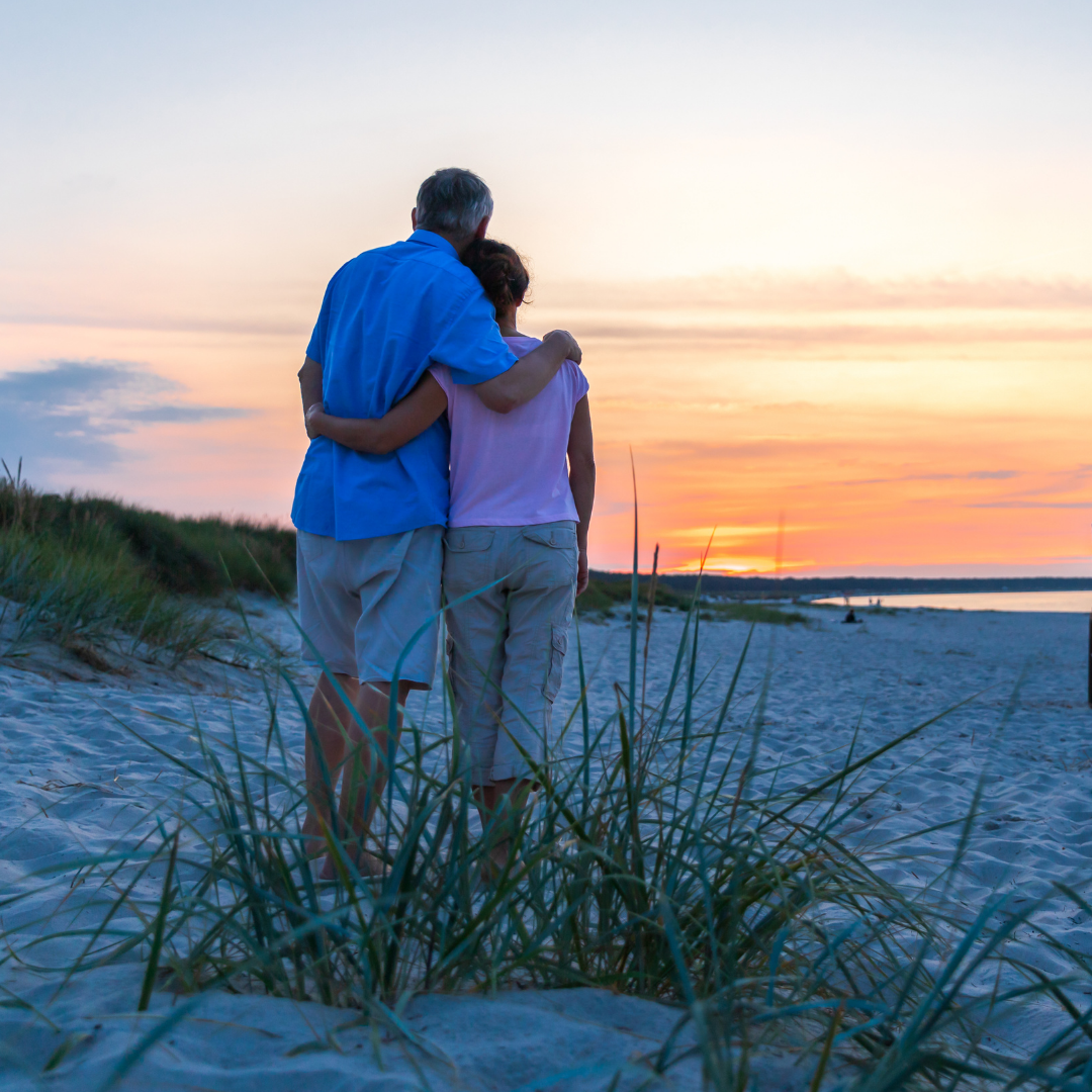 couple on the beach at sunset