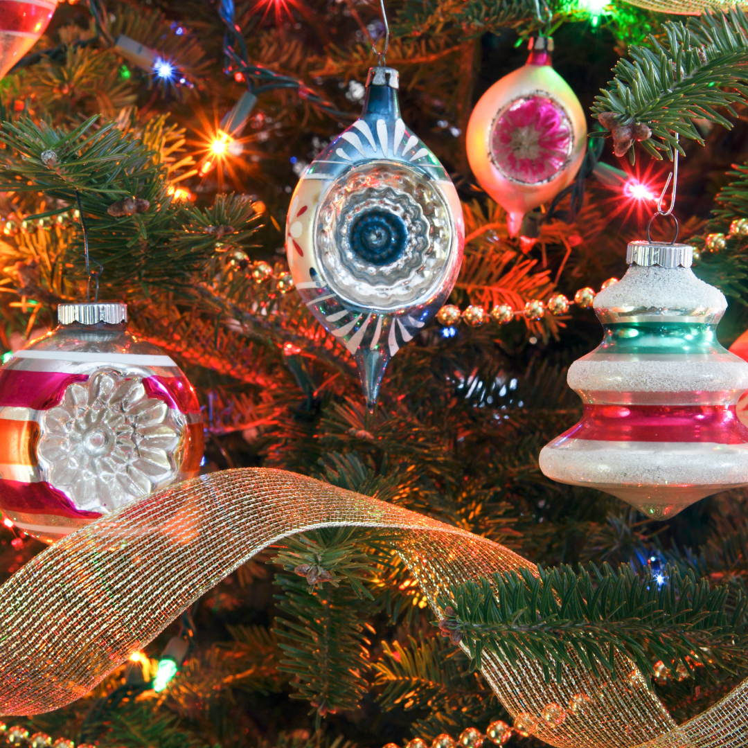 antique ornaments on a Christmas tree