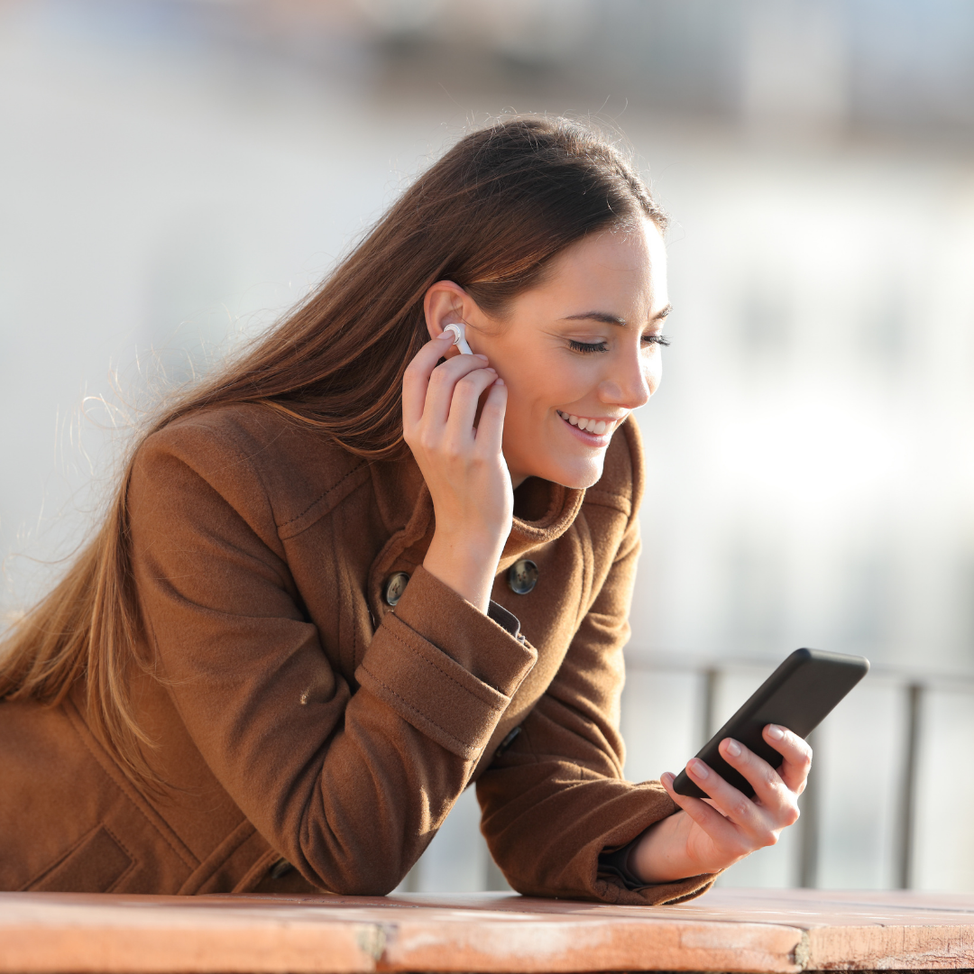 woman listening to earbuds