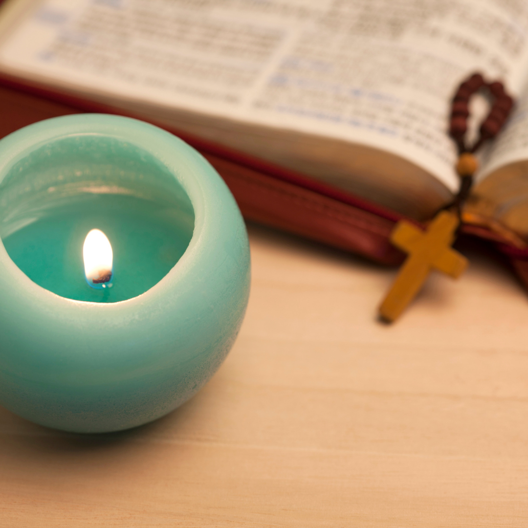 Bible, candle, and tenner Rosary