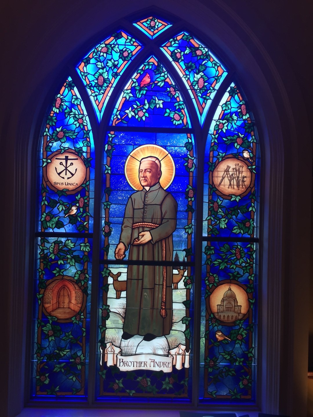 stained glass window of St. Andre Bessette