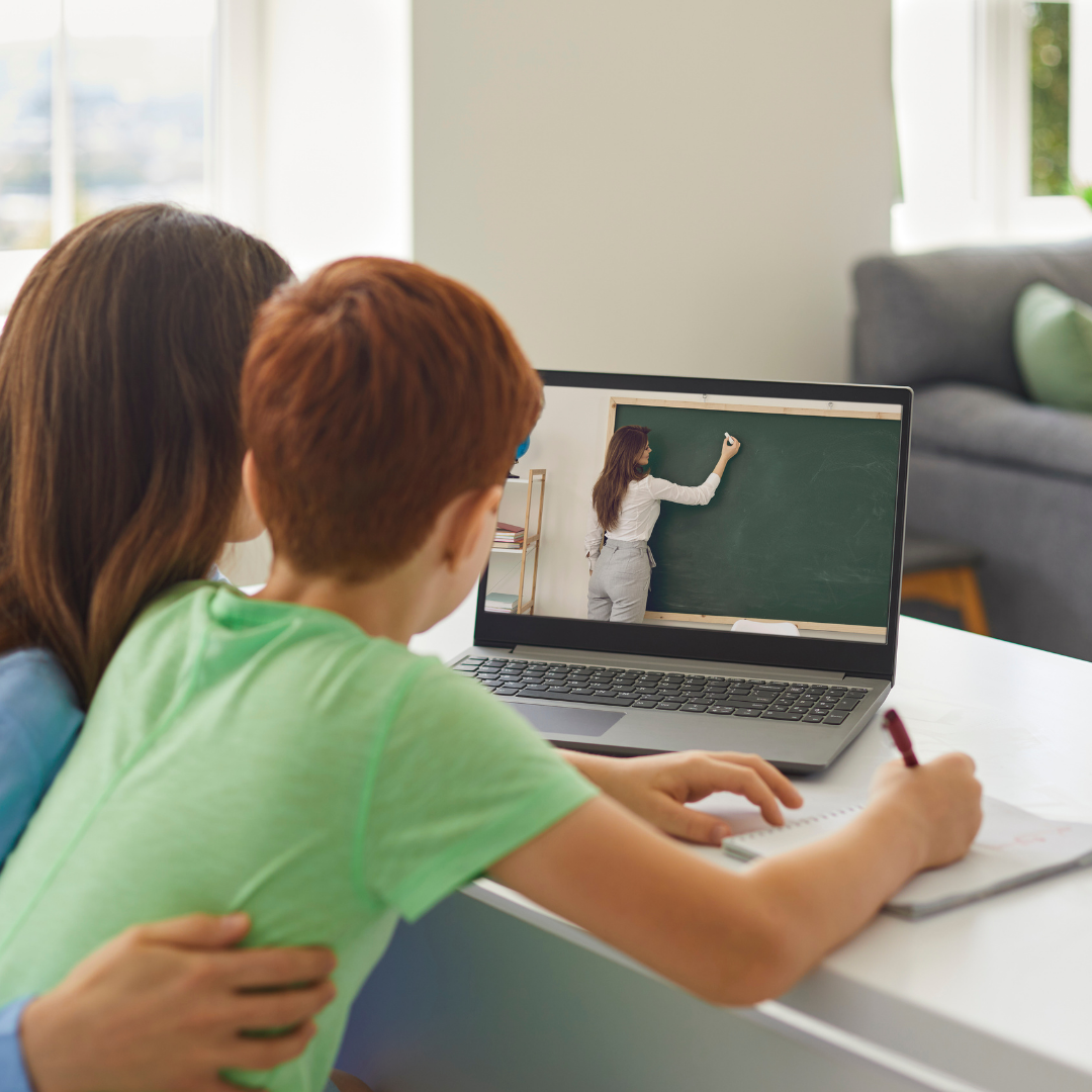 mom and child watching a remote lesson