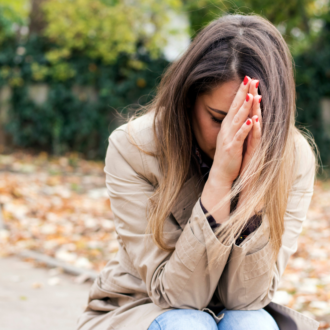 woman praying outdoors