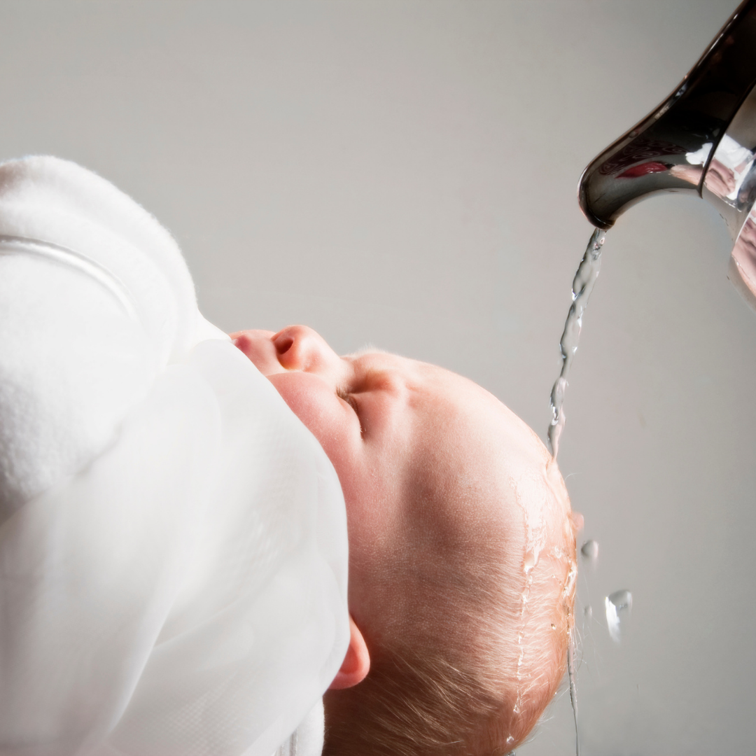 baby being baptized