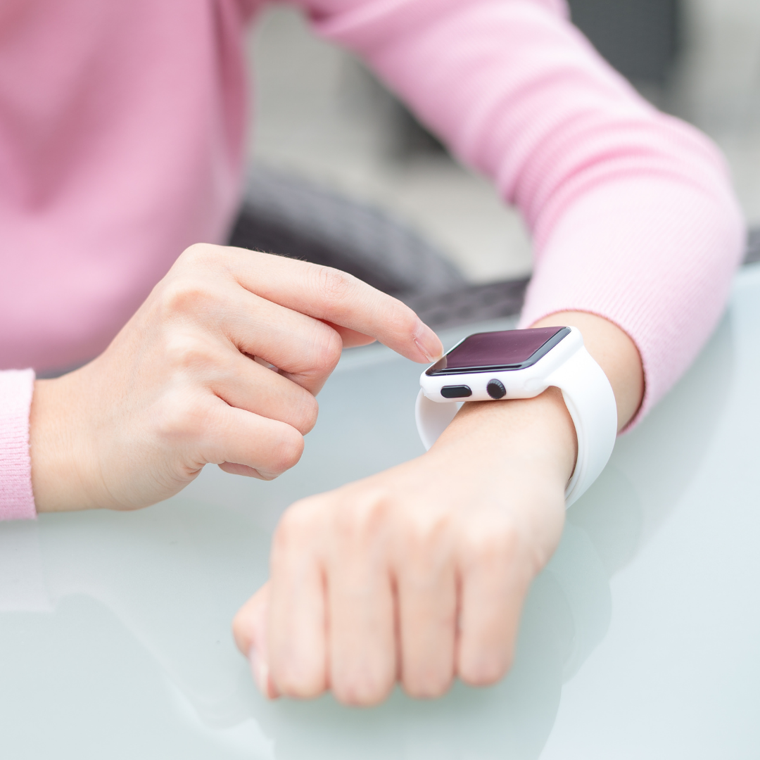 woman using a smart watch