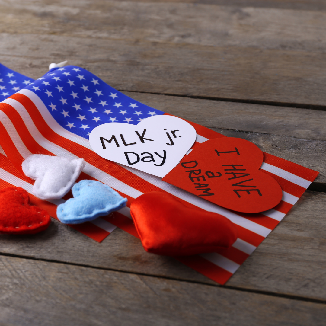 American flag with MLK quote on top