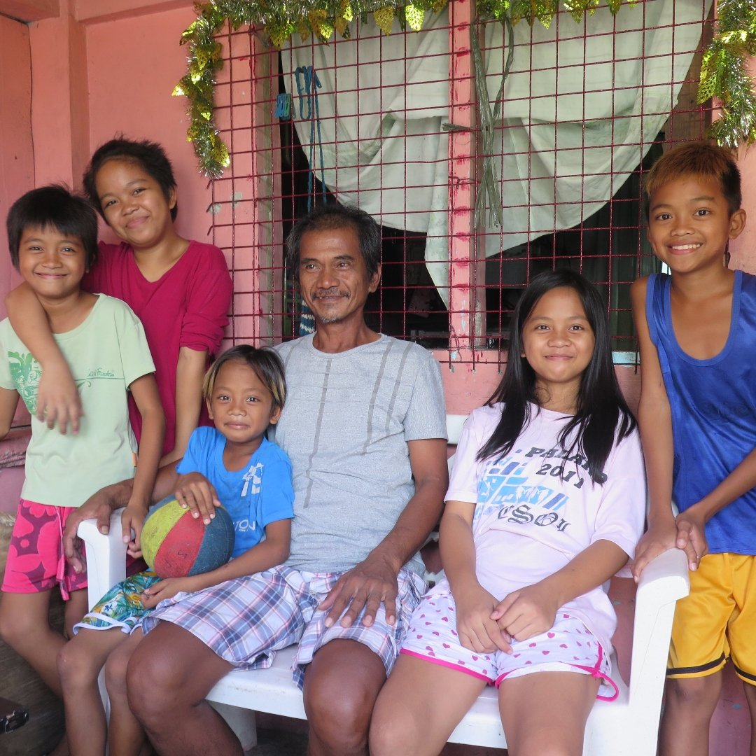 Single father with his children sponsored through Unbound