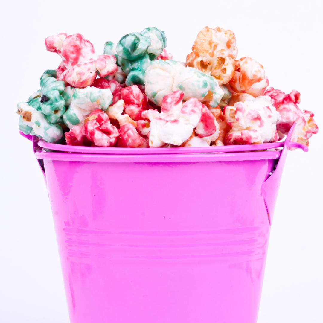 colorful popcorn in pink bucket