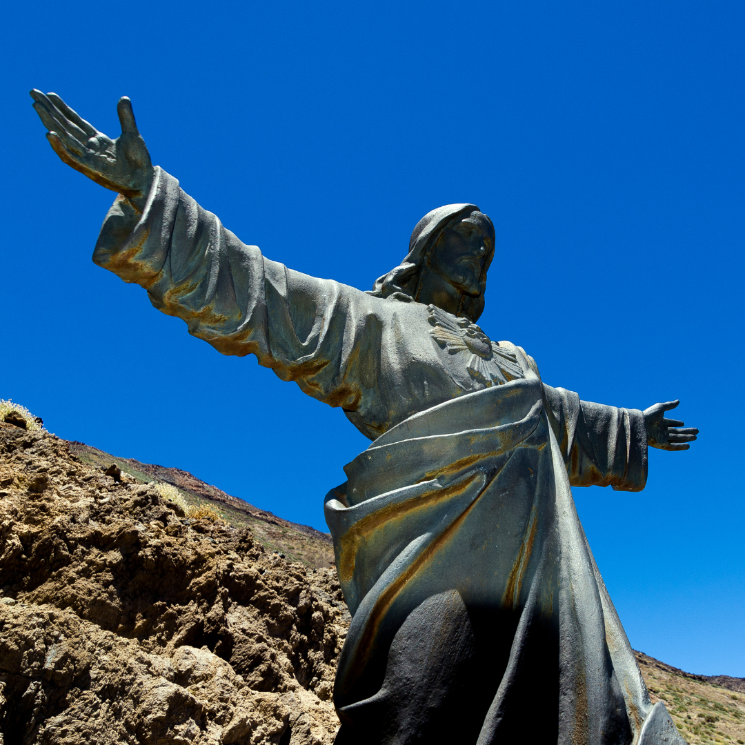 Sacred Heart of Jesus statue with arms outstretched