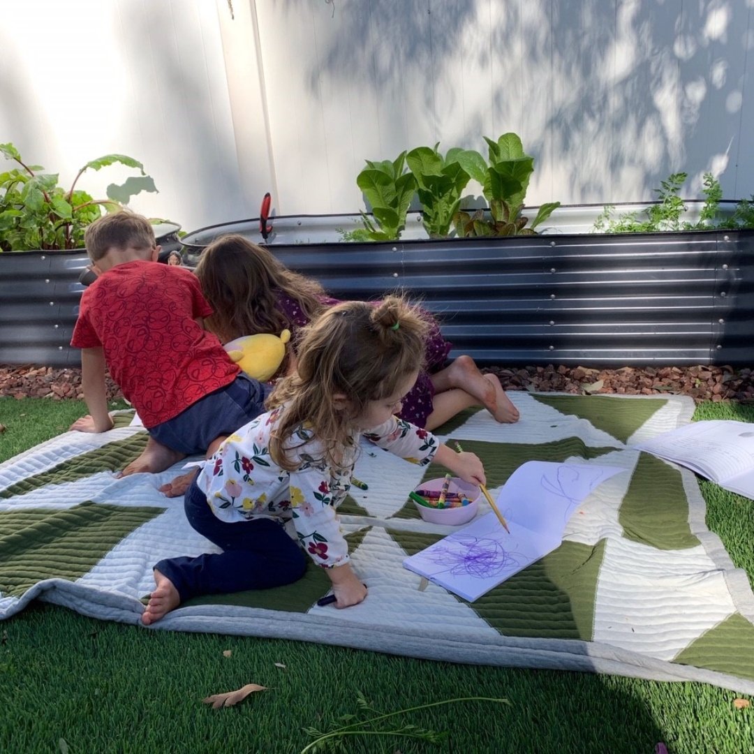 kids working on art projects outdoors