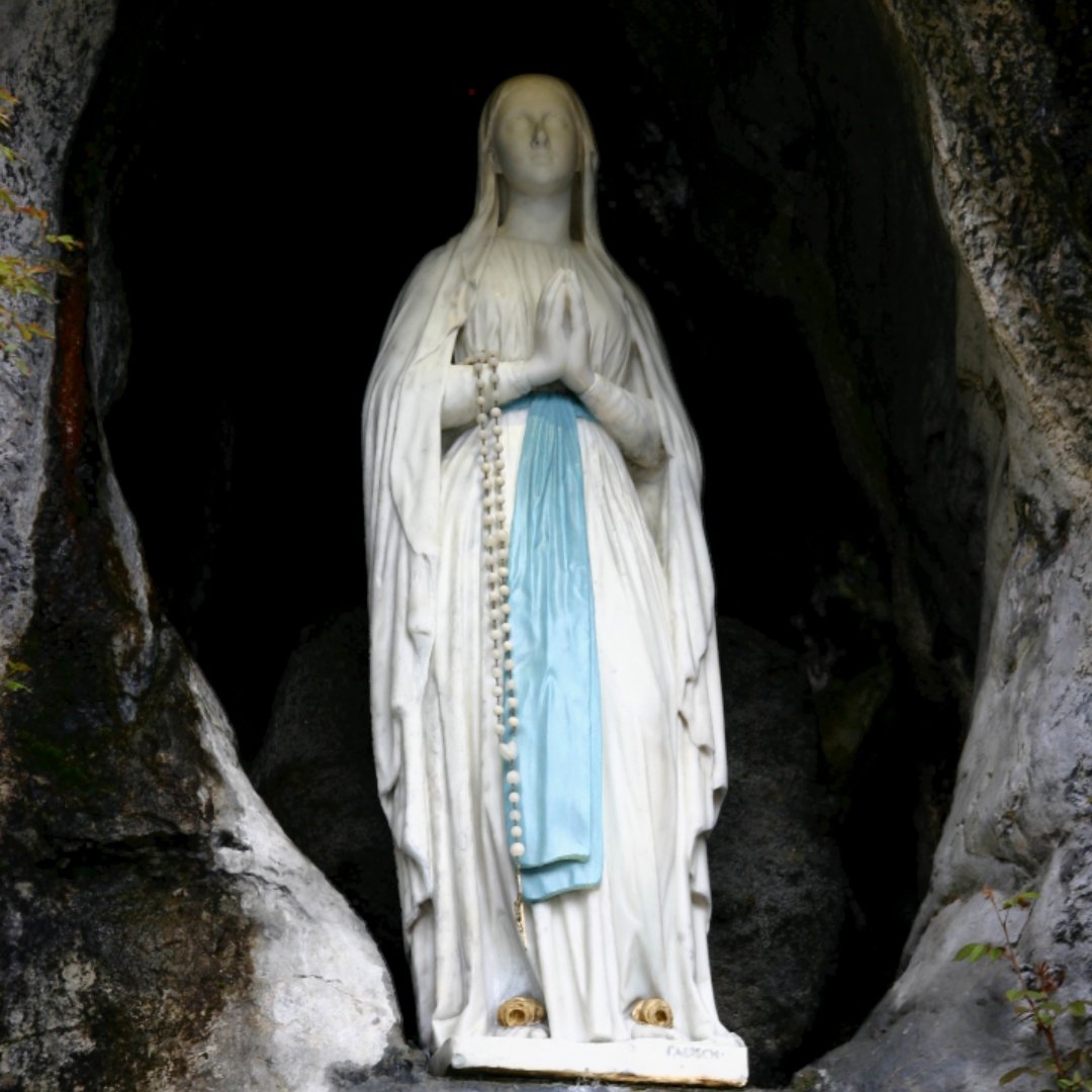 Our Lady of Lourdes statue in grotto at Lourdes