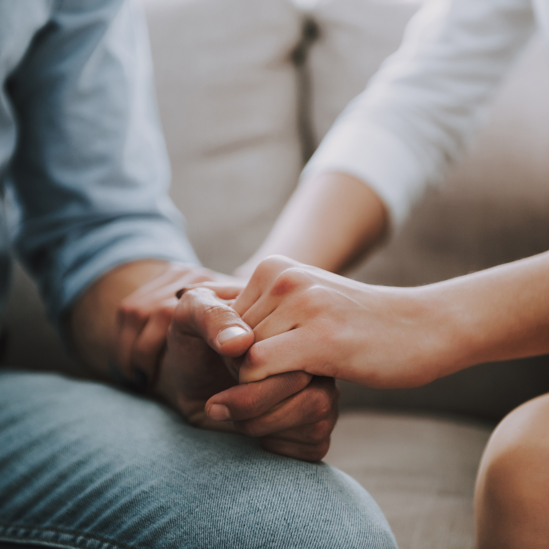 couple holding hands