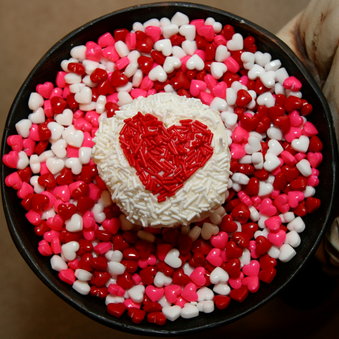 heart shaped cake decorated with heart shaped candy